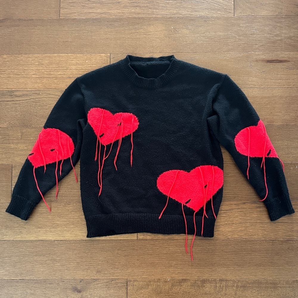 Unlisted Black Crewneck Sweater with Red Drip Heart Motifs